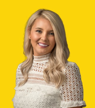 Portrait of Ashley Lamb, Broker/Agent.